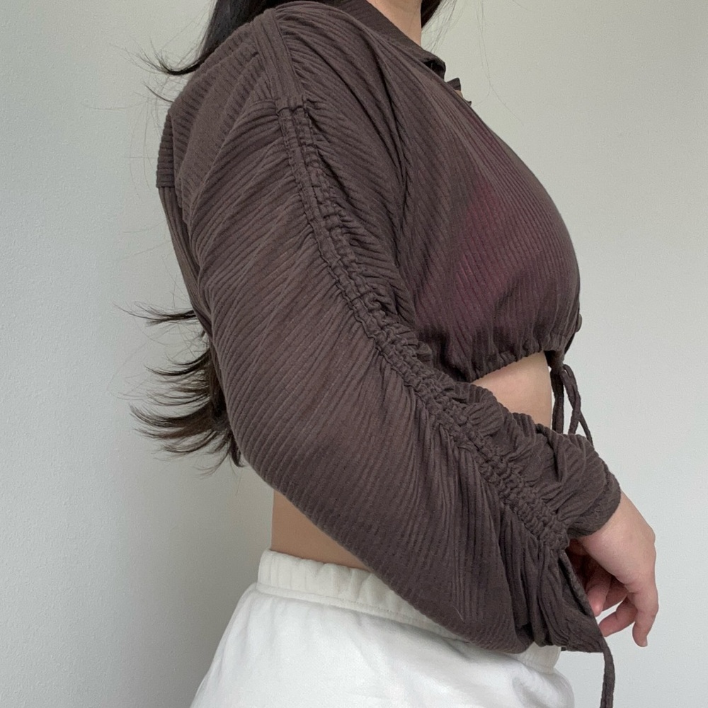 Free People Beach Cropped Long-Sleeve Drawstring Top in Dark Brown- XS